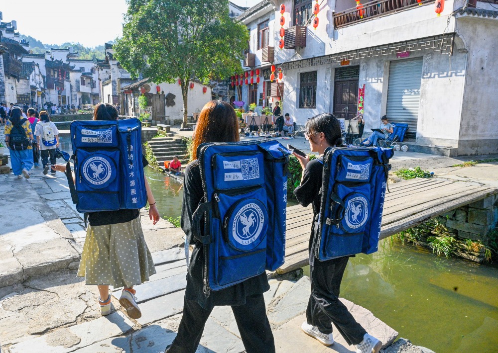 当代中国-新华网评-提高助学贷款额度让大学生圆梦更有底气