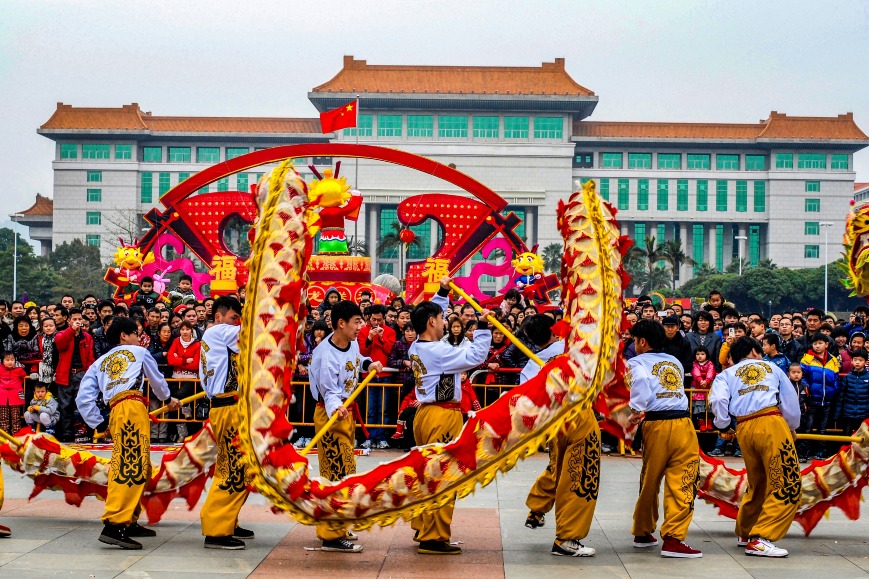 Dragon and lion dances are one of the folk activities for the Spring Festival.