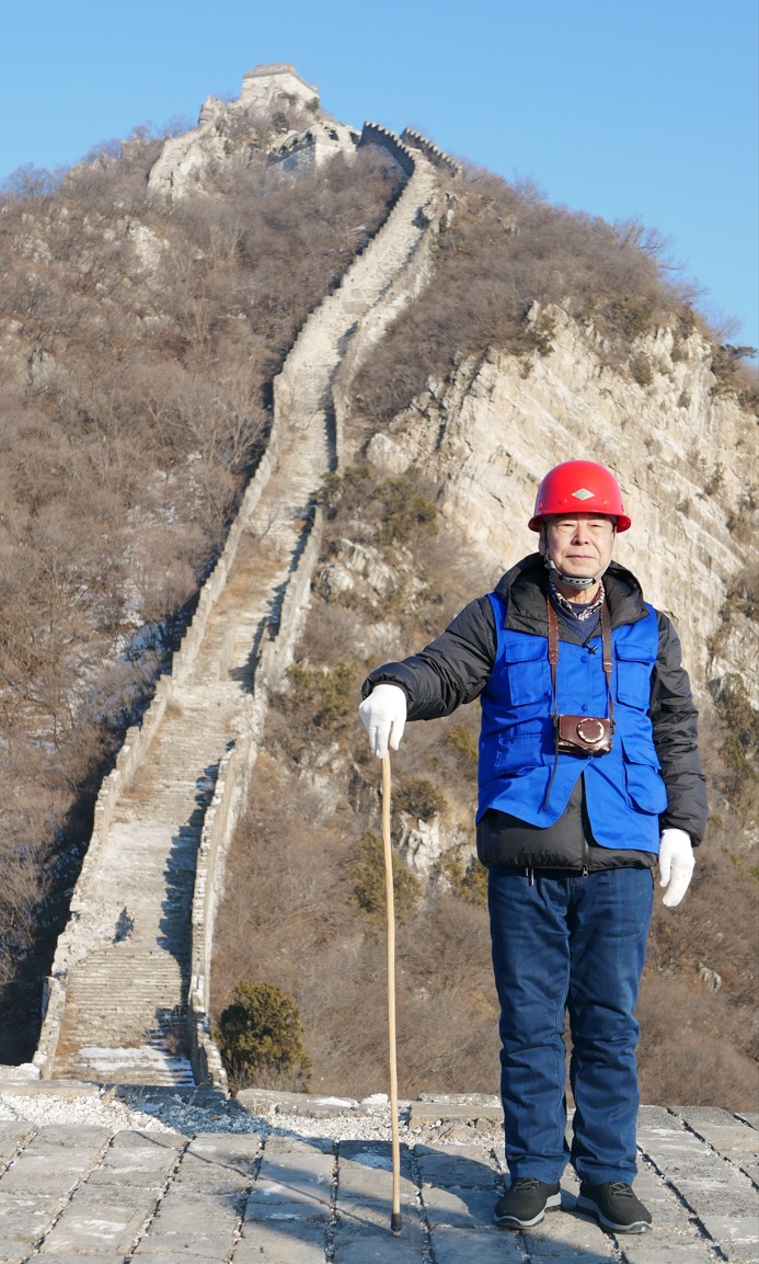 70歲的程永茂，仍然每周兩次攀上箭扣長城的陡峭山脊，進行巡查城牆狀況、檢查施工細節。