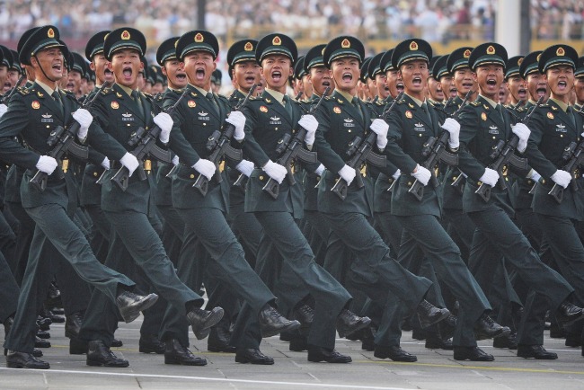 紅軍、八路軍、解放軍，是中共領導的武裝力量在不同時期之名稱。圖為參加閱兵的解放軍戰士。