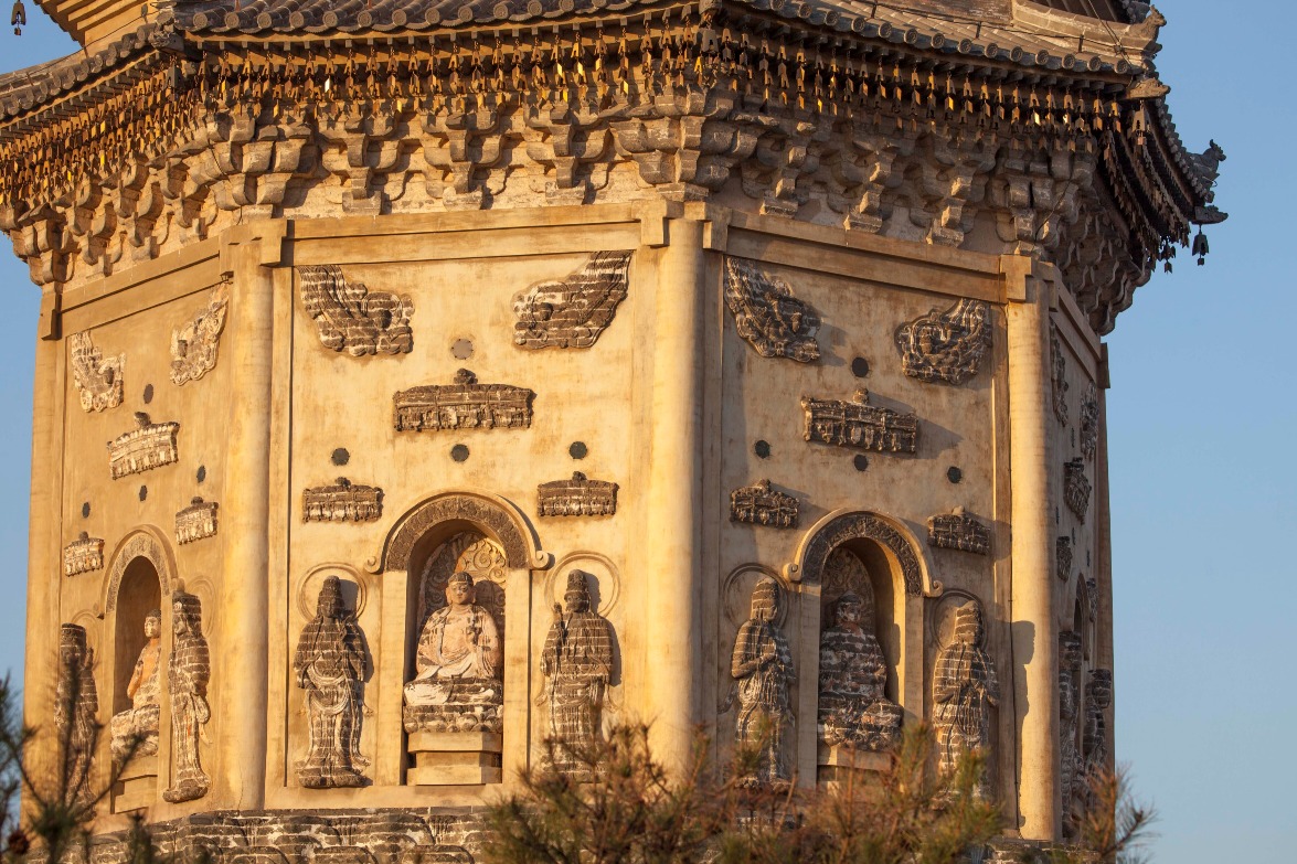 The twin pagodas of Chongxing Temple; the first storey of the east pagoda is covered with exquisite carved artistry