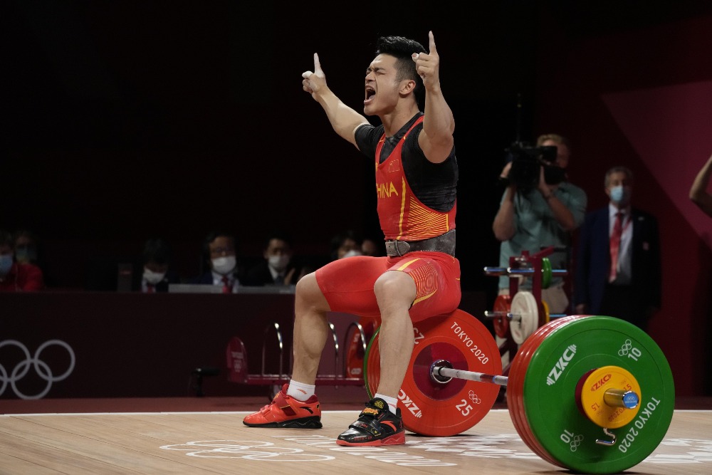 當代中國-體育運動-東京奧運石智勇打破世界紀錄奪金