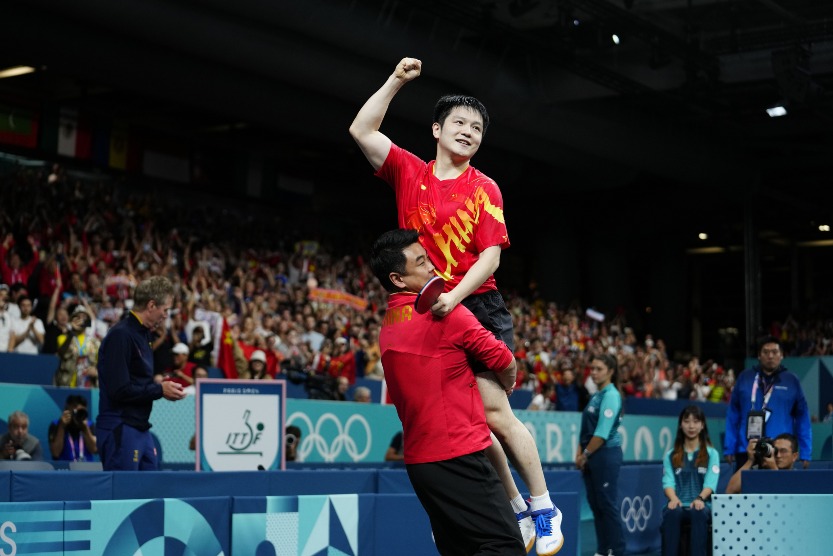 王皓抱起樊振東慶祝 現任國乒男隊主教練王皓抱起樊振東慶祝勝利,二人被稱為「皓月樊星」