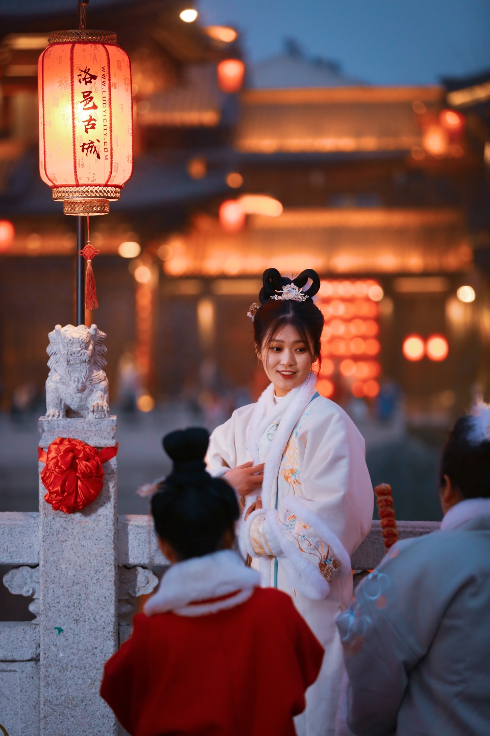 Luoyi Ancient City Tourists in Hanfu taking pictures in Luoyi Ancient City