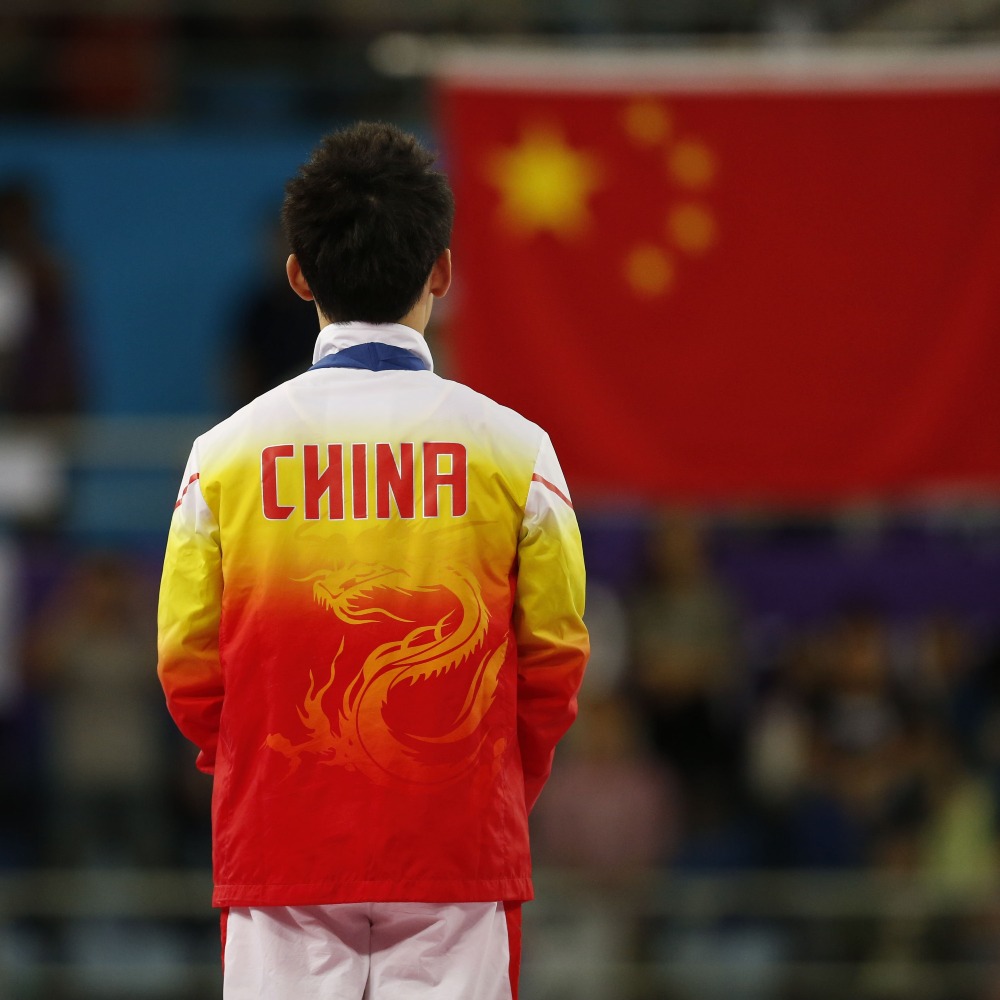 當代中國-新華時評-奧運健兒打開講好中國故事的新聲道