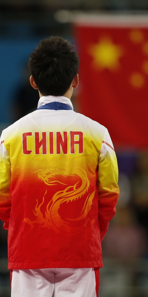 当代中国-新华时评-奥运健儿打开讲好中国故事的新声道