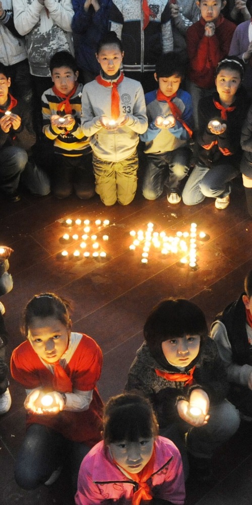 當代中國-當年今日-為青海玉樹地震死難者舉行全國哀悼活動