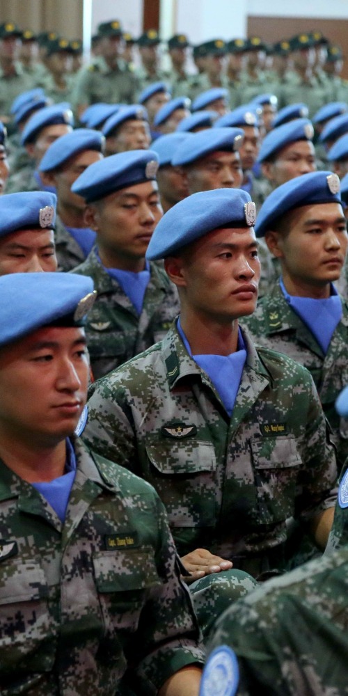 當代中國-當年今日-中國決定原則上參加聯合國維和待命安排