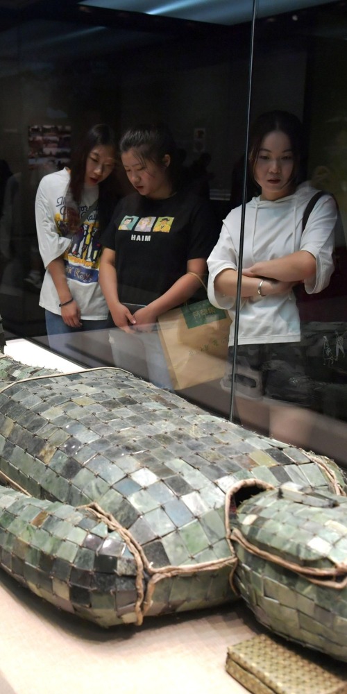 Gold-threaded jade garment